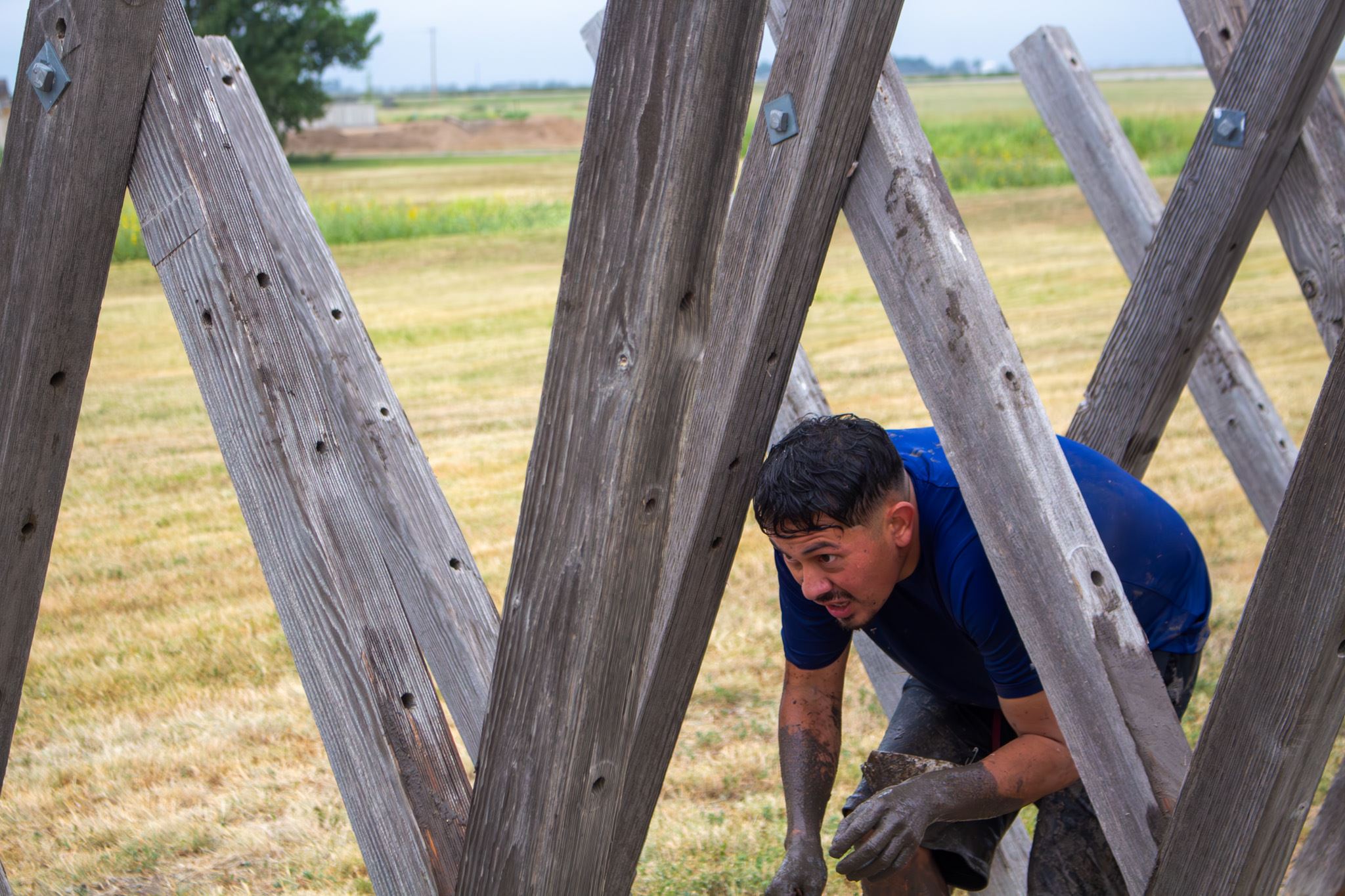 A runner is working his way through an obstacle