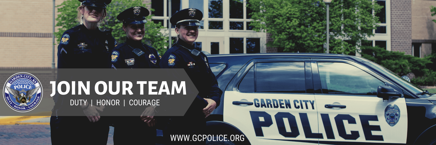 Three Officers by Police Truck